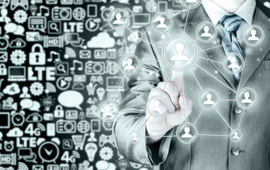 man hand pressing social media icon