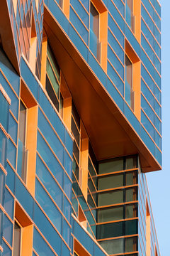 Modern building mirror facade in blue tone