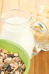 Delicious and healthy cereal in bowl with milk
