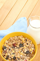 Delicious and healthy cereal in bowl with milk