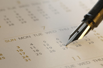 Pen and calendar  close-up  - Stock Image