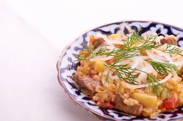 Oriental shah pilaf, pilaw, plov, rice with meat in pastry filo