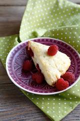 Sweet piece of Scone on the saucer