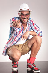 young fashion man pointing at you