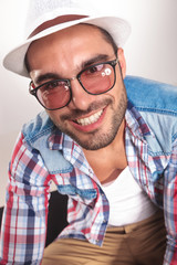 handsome young fashion man wearing sunglasses