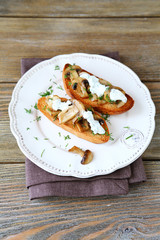 Two tasty bruschetta with mushrooms