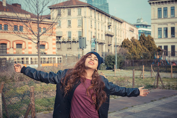Beautiful girl posing in an urban context