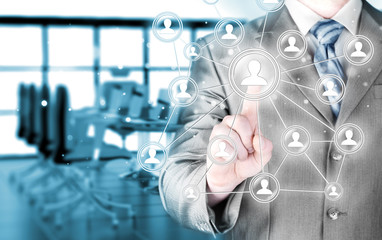 man hand pressing social media icon