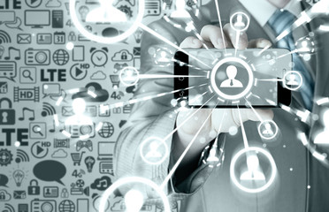 Business Hand holding a phone show the social network