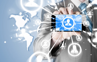 Business Hand holding a phone show the social network