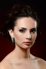 The beautiful woman in jewelry earrings