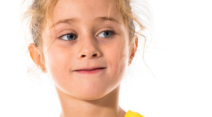 Fototapeta premium Blonde little girl over white background