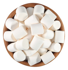 White marshmallow in a wooden bowl on a white