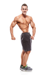 Fototapeta na wymiar Strong Athletic Man Fitness Model Torso showing muscles