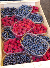 raspberries and blueberries, market in Nyons, Rhone-Alpes, Franc