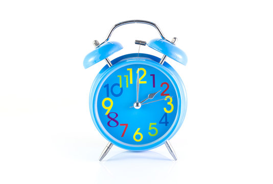 Alarm Clock isolated on white, in blue, showing two o'clock.
