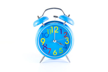 Alarm Clock isolated on white, in blue, showing four o'clock.