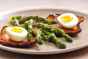 boiled green asparagus with bacon, egg and mustard dip