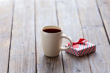 Cup of coffee and gift box