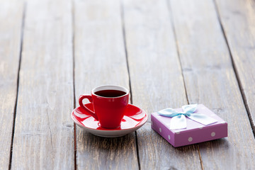 Cup of coffee and gift box