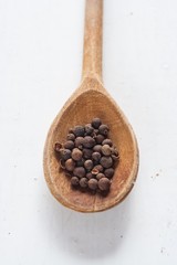 Raisins in wooden spoon