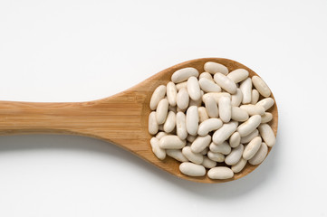 Beans in wodden spoon