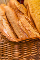 Fresh baguette bread in basket