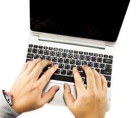 Hands typing keyboard laptop