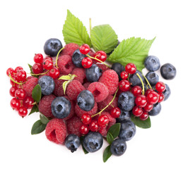 Many blueberries, raspberries. Isolated white