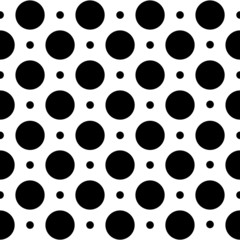 Seamless geometric pattern in polka dots on a white background.