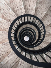 Spiral stairs with black balustrade
