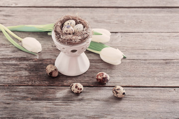 Easter eggs decorations on wooden table