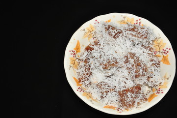 delicious sticky rice cake with coconuts toppings