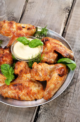 Fried chicken wings with sauce