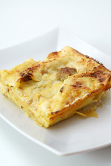 Lasagna besciamella, zucca e salsiccia