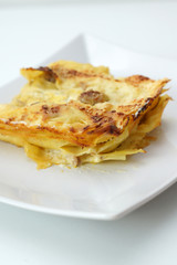 Lasagna besciamella, zucca e salsiccia