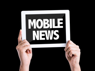 Tablet pc with text Mobile News isolated on black background