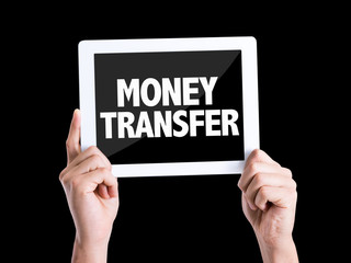 Tablet pc with text Money Transfer isolated on black background