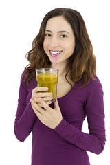 Woman drinking her healthy green juice