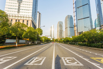 Obraz premium skyline,urban road and office building at daytime.
