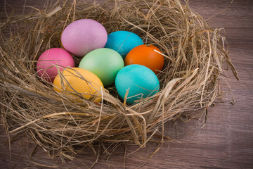 easter nest with colored eggs