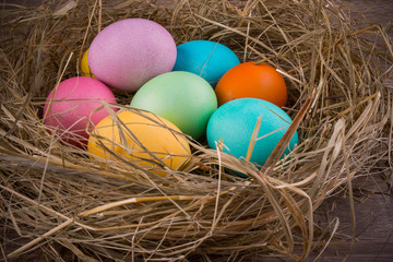 Fototapeta na wymiar easter nest with colored eggs