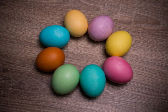Pastel Easter Eggs Circle Isolated On Wooden background
