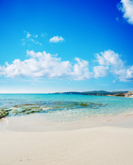 white clouds over the blue sea