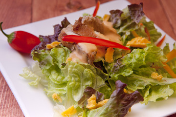 Side salad with chicken.