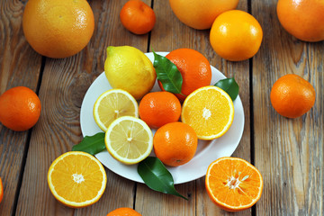 Fototapeta na wymiar Citrus fruits - orange, lemon, tangerine, grapefruit