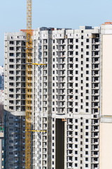 Fototapeta na wymiar Construction of multi-storey residential house