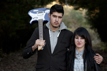 couple with electric guitar