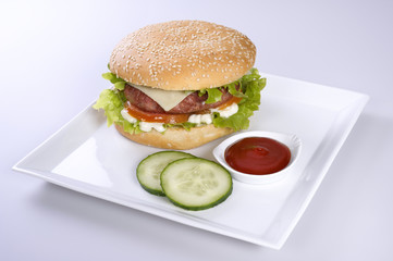 Hamburger with tomato and cucumber