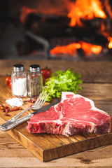 Rustic Fresh steak with spices before throwing a barbecue with a
